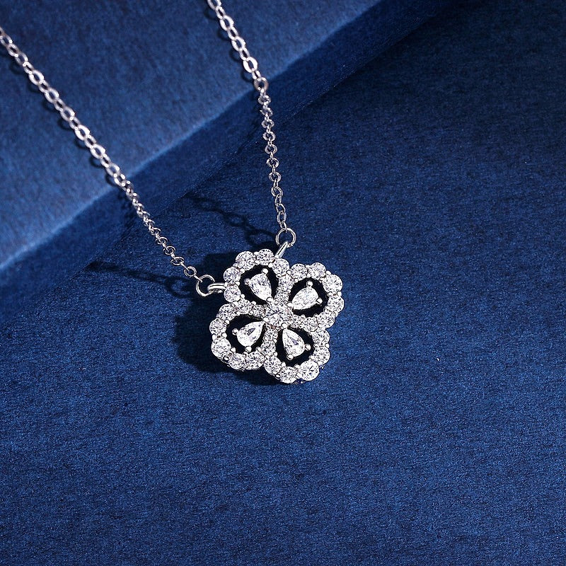 Flower Clover Pendant with Pear-Cut CZ Stones - front view on cream background