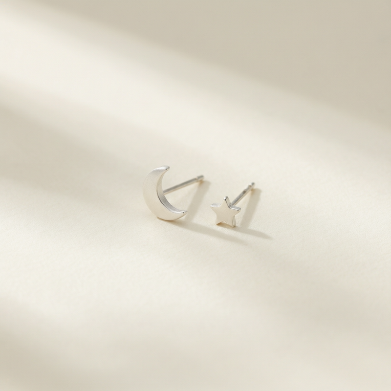 S999 Pure Silver Asymmetric Star and Moon Ear Stud Set