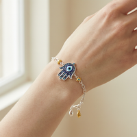 S925 Silver Hamsa Hand Bracelet with Evil Eye and Charms - Lifestyle