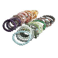 Crystal Healing Stone Beaded Bracelet Collection - front view on cream background